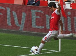 The Locksmith of Modern Football Mikel Arteta taking a corner kick for Arsenal during a Premier League match against Swansea City.
