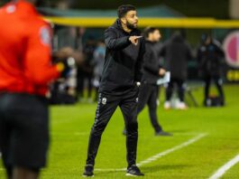 Who is Jeyhan Bhindi? Jeyhan Bhindi directing his team from the touchline during a USL League One match