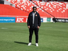 Sergio Jordan, Chief Scout of Fortaleza CEIF, stands on the pitch during a training session in Colombia.