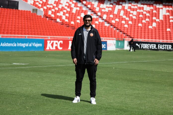 Sergio Jordan, Chief Scout of Fortaleza CEIF, stands on the pitch during a training session in Colombia.