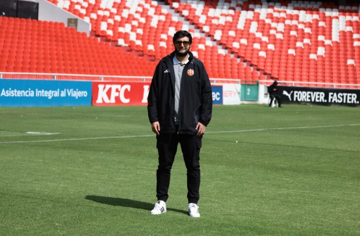 Sergio Jordan, Chief Scout of Fortaleza CEIF, stands on the pitch during a training session in Colombia.