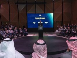 Delegates and speakers gathered in a circular auditorium during the opening ceremony of the World Football Summit in Riyadh.