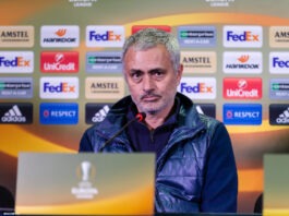 José Mourinho speaking at a Europa League press conference, reflecting his influence beyond football management.